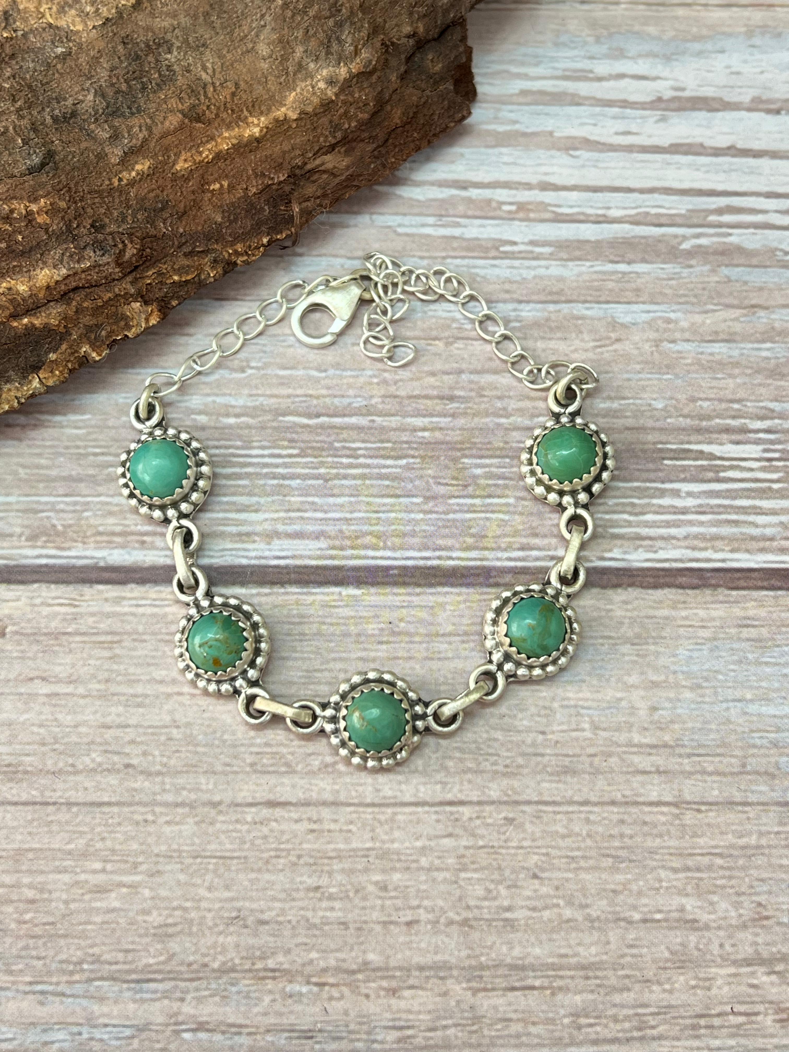 Handmade Sterling Silver Kingman Turquoise Bracelet with Signed Nizhoni
